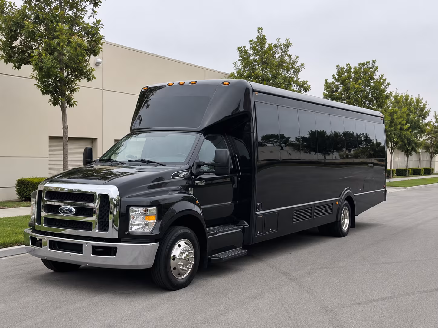 Group beside a Mercedes Sprinter limo in Tucson