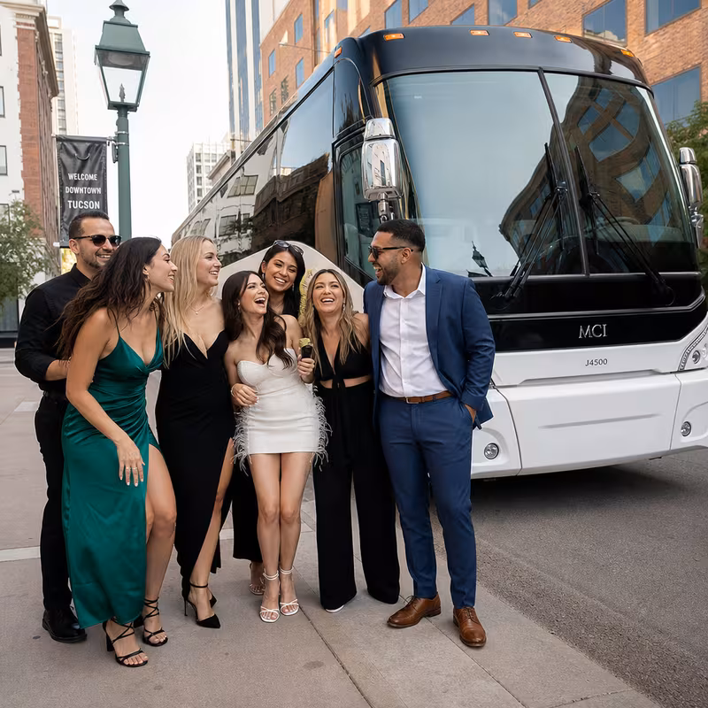 Passengers loading luggage while boarding an Tucson group shuttle